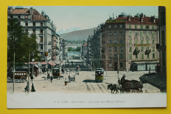 Ansichtskarte AK Genf / Mont Blanc Strasse / 1905-1915 / Hotel Suisse – Straßenbahn – Pferdefuhrwerk – Geschäfte
